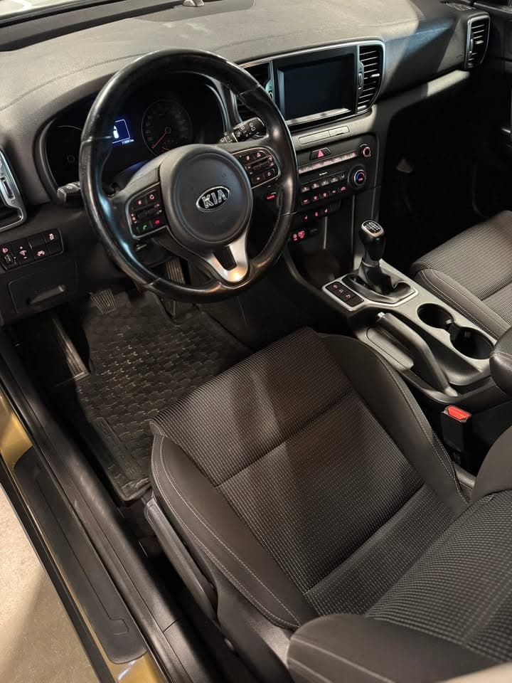 Kia Sportage - photo 12
